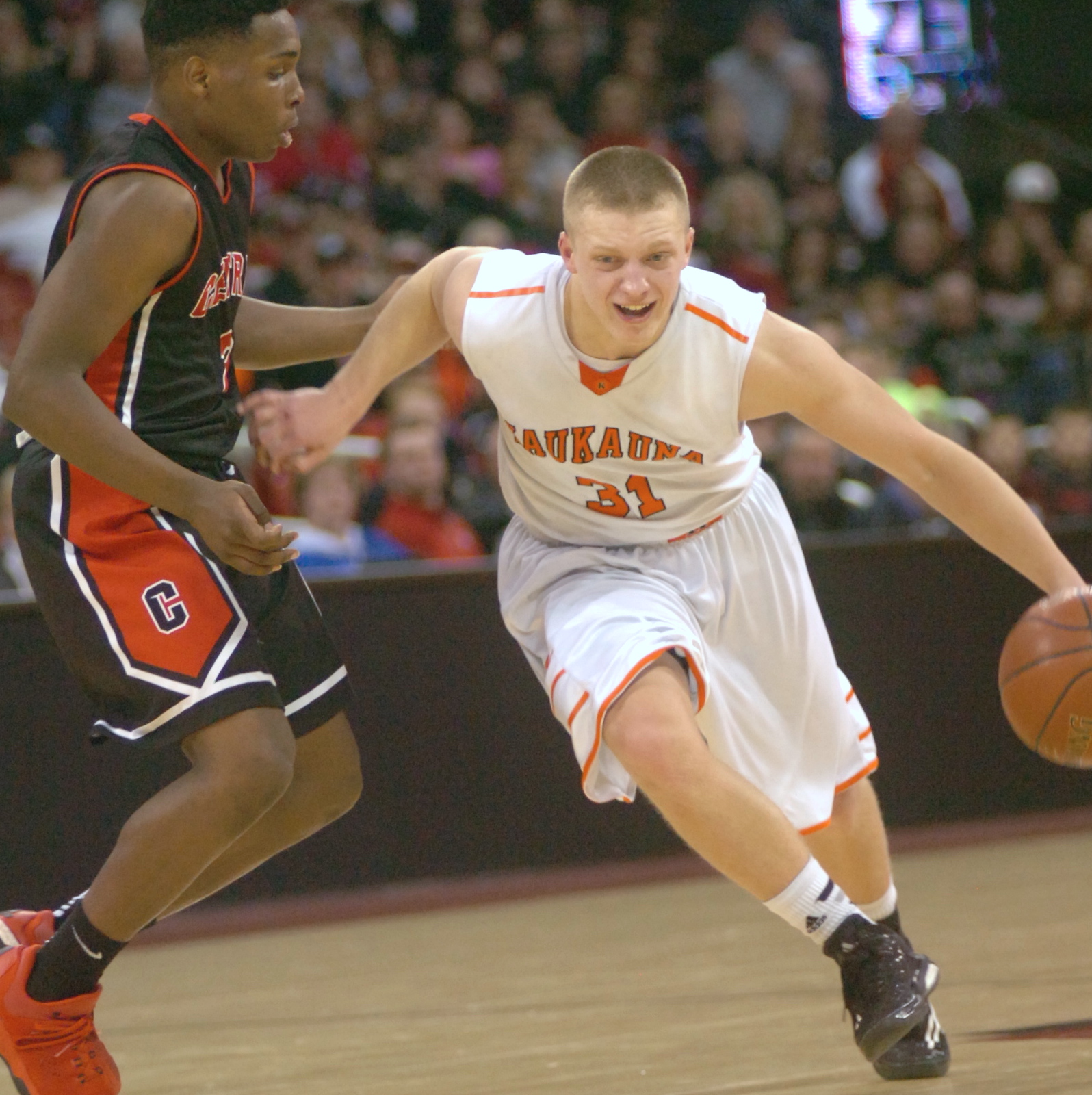 Adam Smith drives to the basket during the second half of Kaukauna's 73-45 WIAA Division 2 semifinal win over La Crosse Central. Dan Plutchak/photo