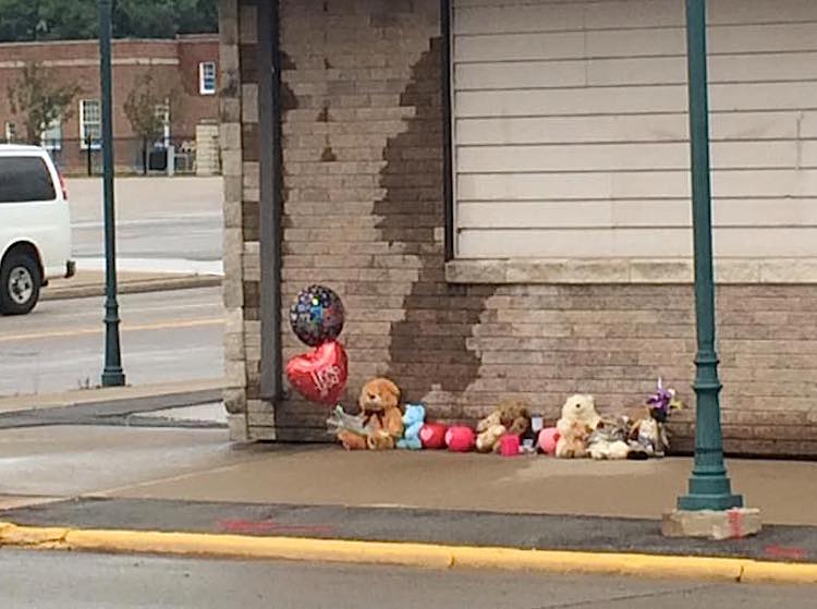 A memorial for  Justin Johnson, the seventh grader who died after being struck by a school bus. Photo by Greg VandeHey.