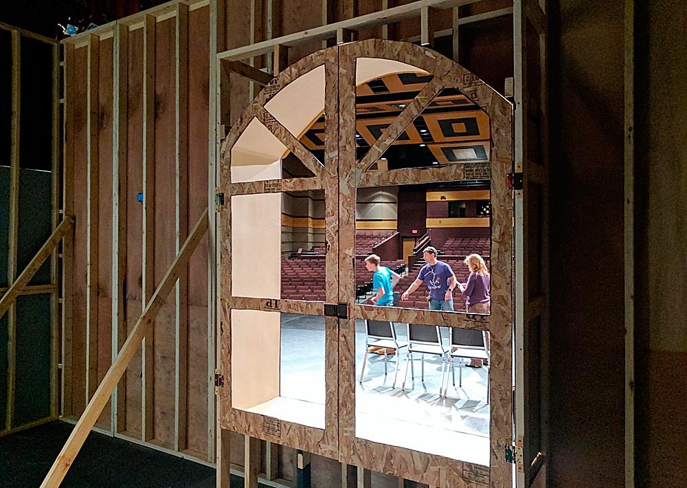 Designers work on the set of “The Mousetrap” which opens Feb. 9, 2017 at Kaukauna High School. Photo via @kaukauanghosts on Twitter.