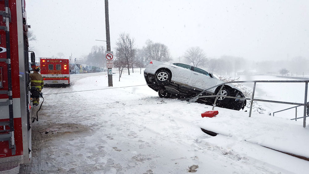 A car narrowly escaped rolling into the Fox River March 1, 2017. Kaukauna Fire Department photo