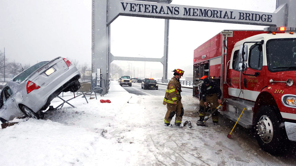 A car narrowly escaped rolling into the Fox River March 1, 2017. Kaukauna Fire Department photo