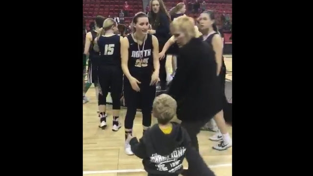 Appleton North post game celebration hug denied