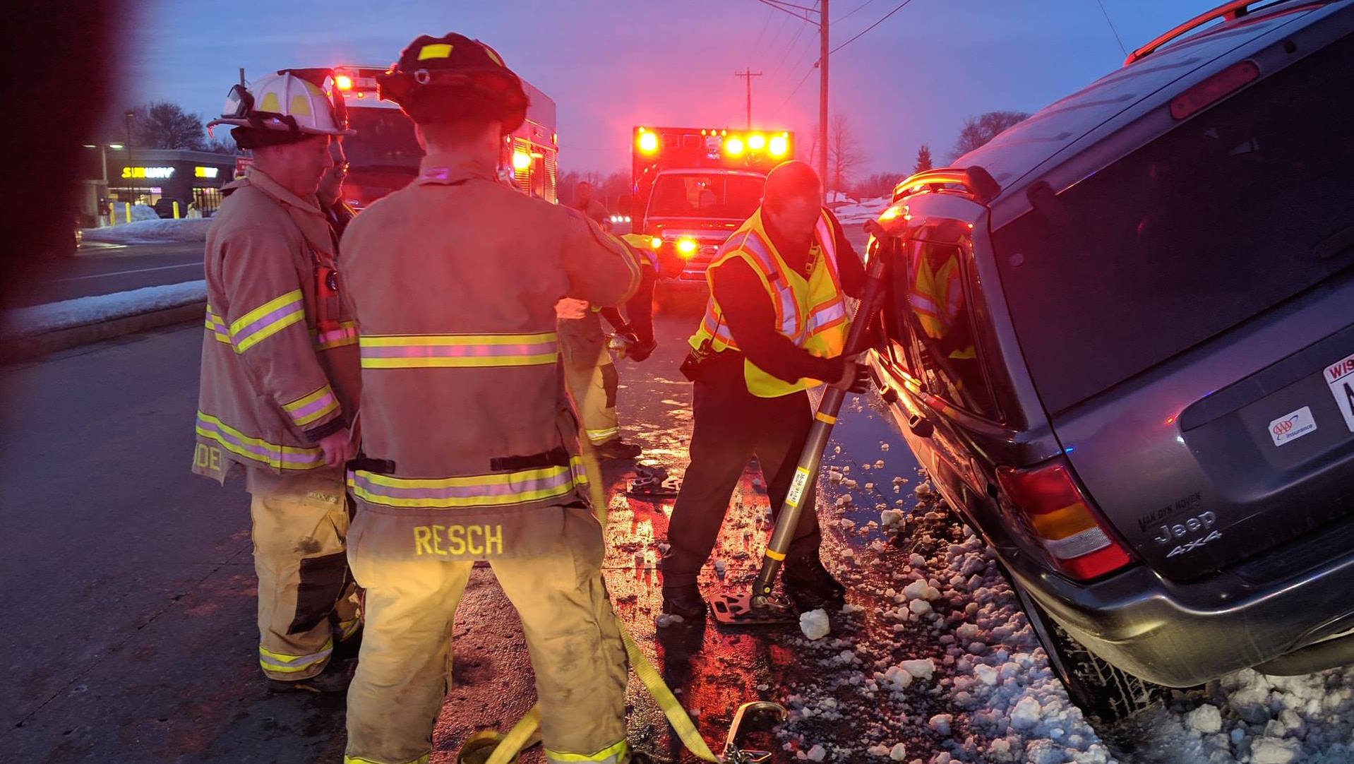 Firefighters work to remove a driver from a vehicle Feb. 22, 2019 on Crooks Avenue in Kaukauna. Kaukauna Fire Department photo