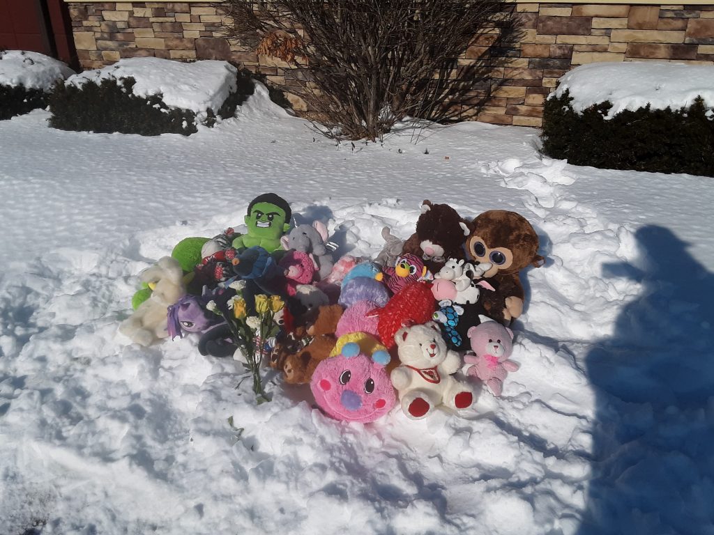 A memorial for William and Danielle Beyer outside of the PIzza Hut in downtown Kaukauna. Tanya Zehren photo
