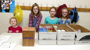 Students at New Directions Learning Center collect donations Feb. 27, 2017 for the birthday box project. Kristin Mceneaney photo.