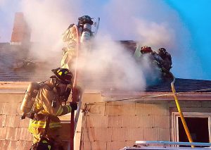 Firefighters knock down a house fire on Crooks Avenue March 5, 2017. Kaukauna Fire Department photo.