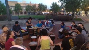 Drum circle file photo, Electric City Experience.