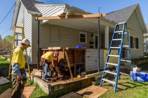 Volunteers work on a project during the the 2017 Habitat for Humanit Rock the Block community build in Kaukauna. Graham Washatka photo