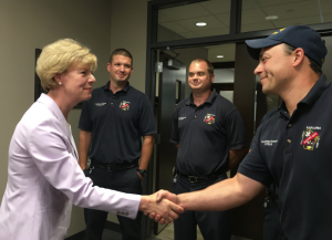 Sen. Tammy Baldwin meets with Kaukauna firefighters May 29, 2018 prior to a roundtable on illegal opioids.