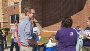 Senate candidate Tom Nelson of Kaukauna rallies with health care workers in Wisconsin Rapids.