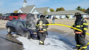 Firefighters put out a car fire Thursday in Combined Locks. Combined Locks Public Safety photo
