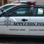 Police talk down gun-wielding man from roof of Appleton building