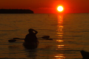 Kayaks at sunset, Door County, Wisconsin, summer 2022. Photo by Dan Plutchak