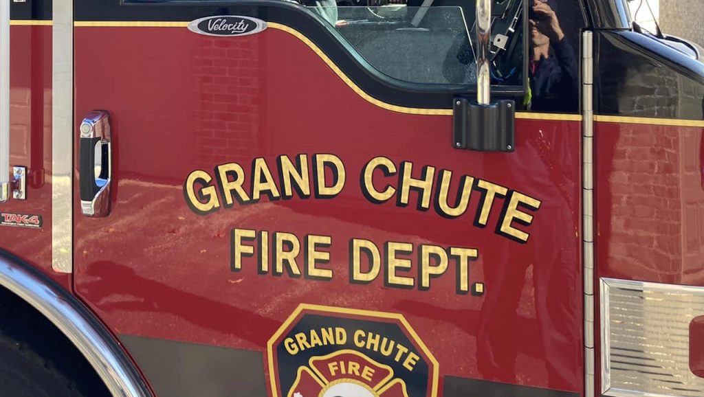 Residents displaced following fire in attached garage of Grand Chute