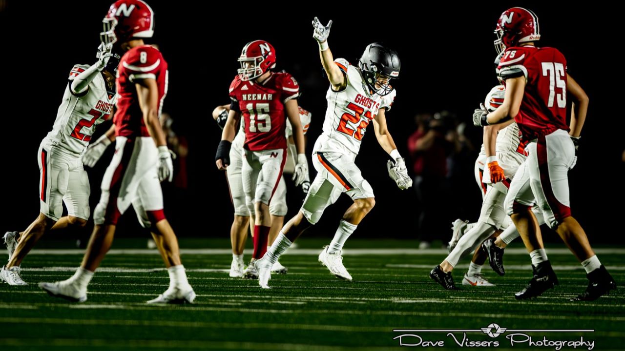 Defensive back John Neumann celebrates a play during the Ghosts win over Neenah. Photo by Dave Vissers. More photos at Dave Vissers Photography