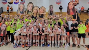 Kaukauna girls volleyball players and students pose after the Ghosts took down Appleton East in straight sets in September. KHS photo