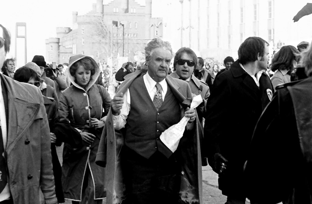 Student government vice president Jim Mallon with Wisconsin Gov. Lee Dreyfus as the governor is about to get a pie in the face during a fundraiser April 6, 1979 on campus.