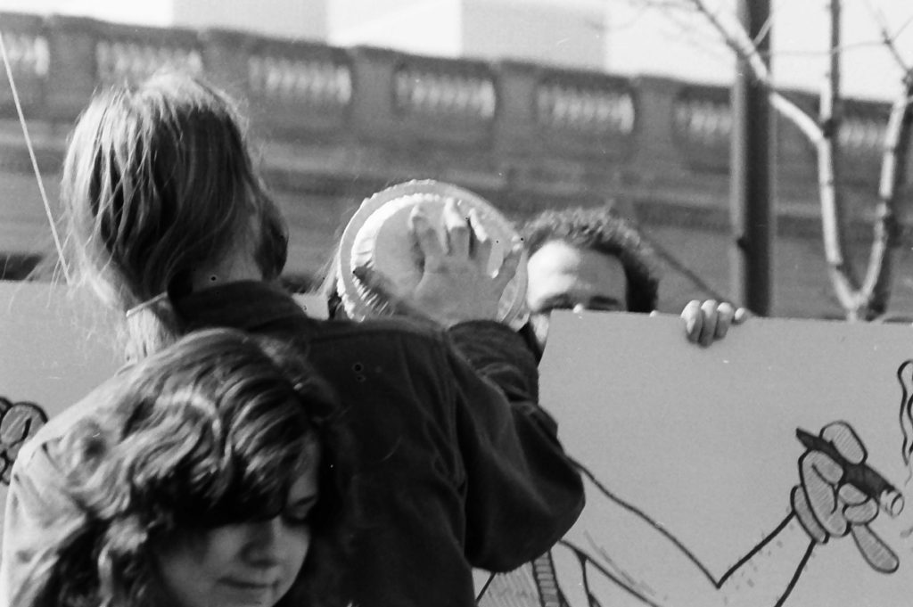 Student government vice president Jim Mallon with Wisconsin Gov. Lee Dreyfus as the governor is about to get a pie in the face during a fundraiser April 6, 1979 on campus.