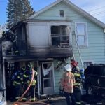 WATCH: Officers use ladder found nearby to rescue resident from upper unit of burning home in southern Wisconsin