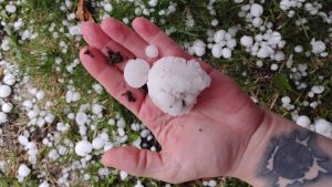 A tight band of storms Friday morning dropped a up to baseballs-sized hail on communities in the southern part of the state.