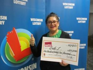 Holly Jolly Raffle winner from De Pere claims $125,000 lottery prize