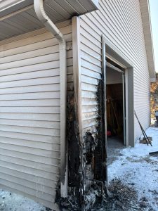 Emergency crews respond in bitter cold temps to garage fire in town of Vandenbroek