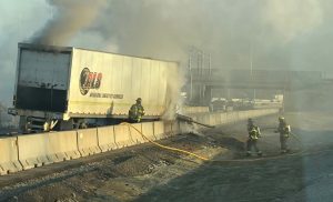 Fully engulfed semi tractor closes part of I-41 Monday morning in Grand Chute