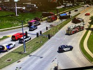 One dead in rollover crash involving wrecker towing a dump truck