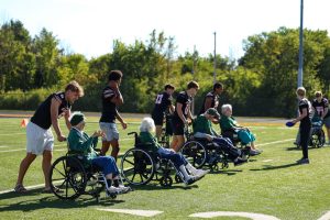 Senior residents, Kaukauna Ghosts football team, pair up for first ever Senior Living Football League game